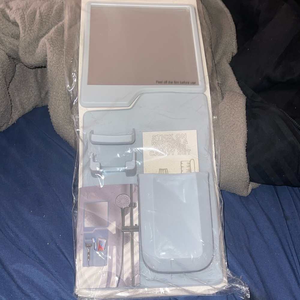Stick on mirror and shower caddy set